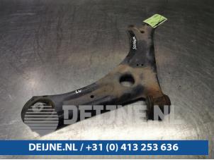 Volkswagen Caddy Front lower wishbone, left O94812 photo 2
