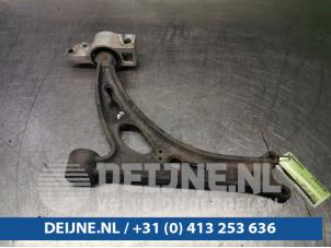 Volkswagen Caddy Front lower wishbone, left O95352 photo 2