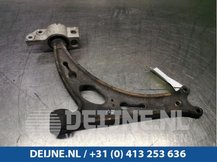 Volkswagen Caddy Draagarm onder rechts-voor O95353
