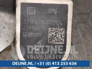 BMW 3-Serie Xenon hoogteregelaar O98518 foto 2