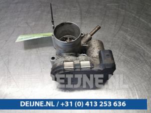 Volkswagen Polo Drosselklappengehäuse O99112 foto 3
