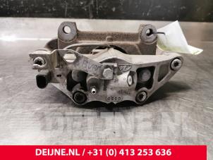 Audi A6 Bremszange links vorne O110734 foto 2