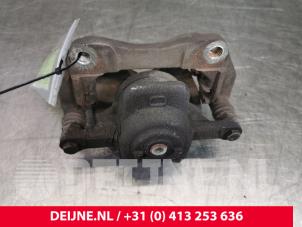 Ford Transit Courier Front brake calliper, left O113135 photo 2