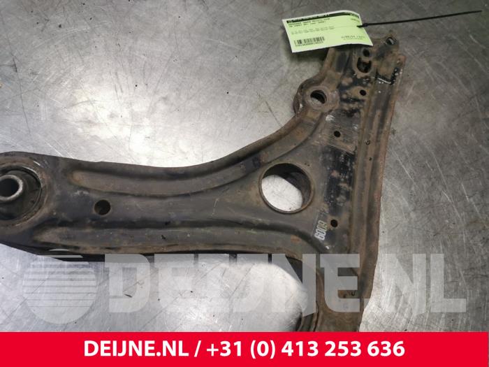 Volkswagen Caddy Draagarm onder rechts-voor O140223