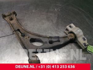 Volkswagen Caddy Front lower wishbone, left O140261 photo 2