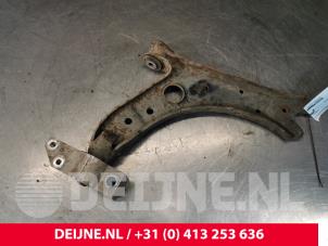 Volkswagen Caddy Front lower wishbone, left O154809 photo 2