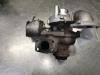 Turbo van een Ford Transit Connect (PJ2) 1.6 TDCi 16V 75 2015