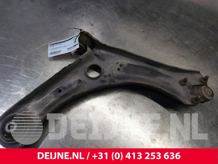 Volkswagen Caddy Draagarm onder links-voor O160485