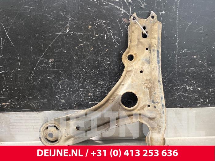 Volkswagen Caddy Draagarm onder links-voor O172819