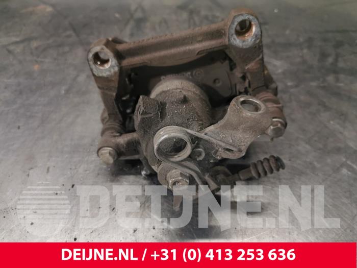 Volkswagen Transporter Bremszange links hinten O186159
