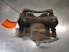 Ford Transit Courier 1.0 Ti-VCT EcoBoost 12V Remklauw (Tang) links-voor