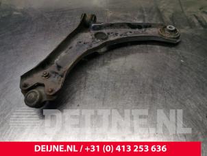 Volkswagen Caddy Draagarm onder rechts-voor O204190 foto 2