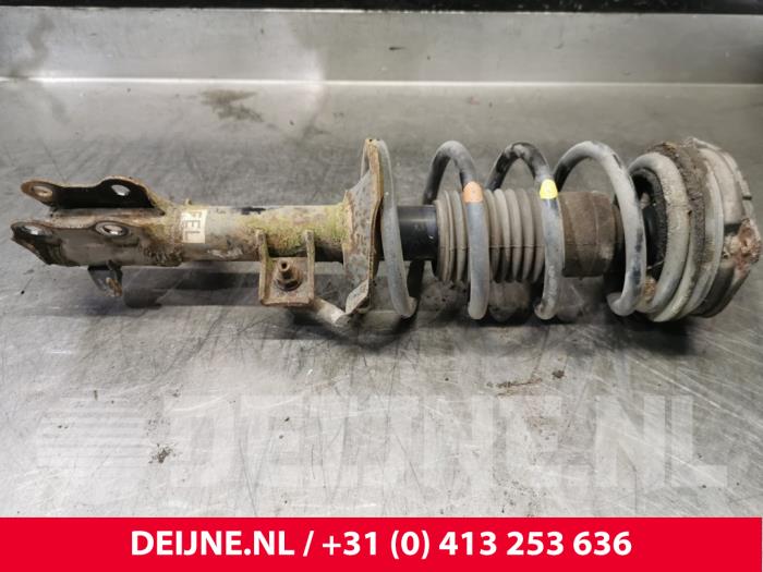 Nissan NV200 Schokdemperpoot links-voor O217573