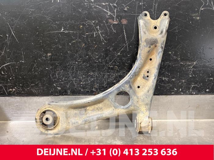 Volkswagen Caddy Front lower wishbone, left O218031