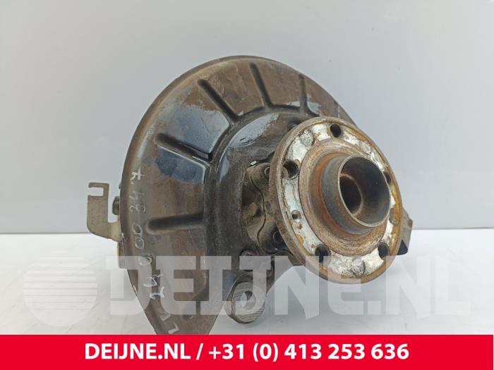 Volkswagen Caddy Fusee links-voor O231190