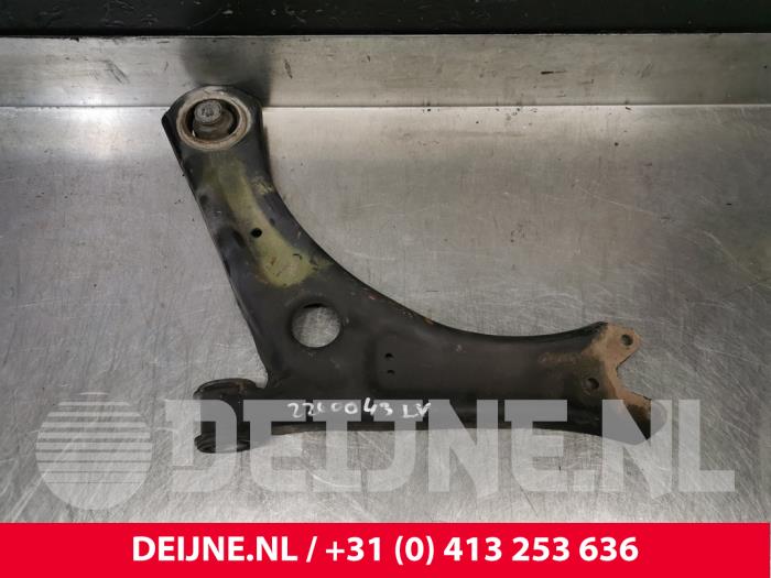 Volkswagen Caddy Draagarm onder links-voor O234456