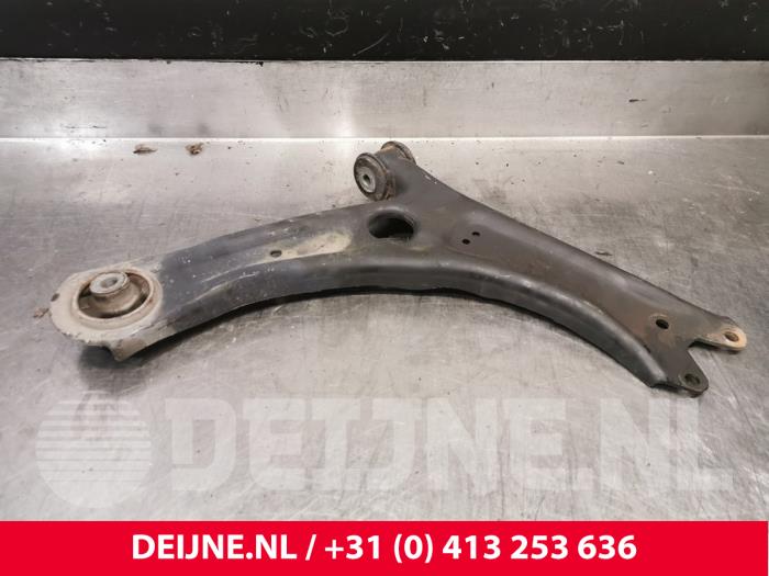 Volkswagen Caddy Draagarm onder rechts-voor O234461
