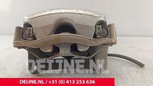 Volkswagen Caddy Front brake calliper, left O247519 photo 2