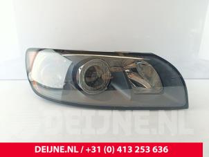Gebruikte Koplamp rechts Volvo S40 (MS) Prijs € 60,00 Margeregeling aangeboden door van Deijne Onderdelen Uden B.V.