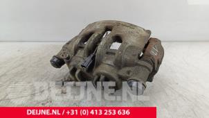 Nissan Interstar Front brake calliper, left O282614 photo 2