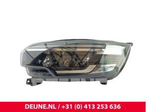 Nissan Primastar Koplamp links O302093 foto 2