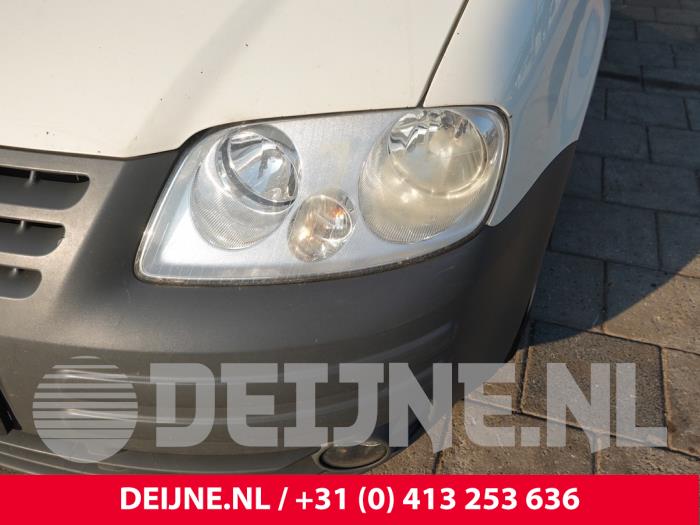 Volkswagen Caddy Scheinwerfer links O317085