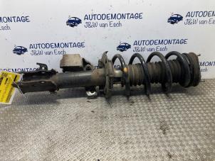 Gebruikte Schokdemper links-voor Ford Tourneo Courier (JU2) 1.0 Ti-VCT EcoBoost 12V Prijs € 60,50 Inclusief btw aangeboden door Autodemontage J&W van Esch