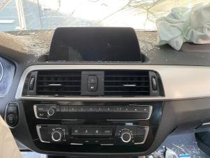 Gebruikte Radiobedienings paneel BMW 1 serie (F20) 116i 1.5 12V Prijs op aanvraag aangeboden door Autohandel-Smet Gebroeders NV