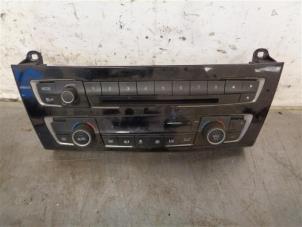 Gebruikte Radiobedienings paneel BMW 1 serie (F20) 118d 2.0 16V Prijs op aanvraag aangeboden door Autohandel-Smet Gebroeders NV