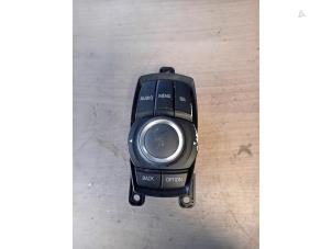 Gebruikte MMI schakelaar BMW 1 serie (F20) 120i 1.6 16V Prijs op aanvraag aangeboden door Autohandel-Smet Gebroeders NV