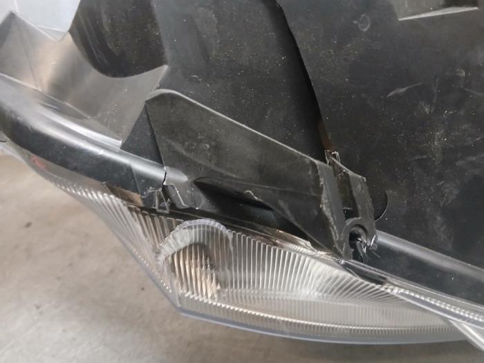 Koplamp links van een Ford B-Max (JK8) 1.0 EcoBoost 12V 125 2013