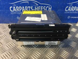 Gebruikte CD Speler BMW 1 serie (E81) 118i 16V Prijs € 300,00 Margeregeling aangeboden door Carparts Heesch