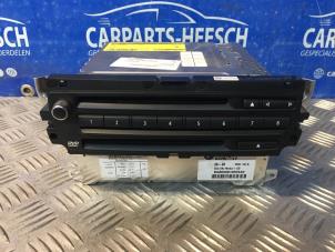 Gebruikte Navigatie Module BMW 1 serie (E81) 118i 16V Prijs € 400,00 Margeregeling aangeboden door Carparts Heesch