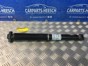 Gebruikte Schokdemper links-achter Ford Focus 3 Wagon 1.0 Ti-VCT EcoBoost 12V 125 Prijs € 21,00 Margeregeling aangeboden door Carparts Heesch