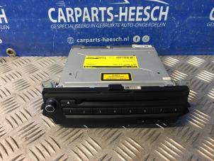 Gebruikte CD Wisselaar BMW 1 serie (E81) 116i 1.6 16V Prijs € 175,00 Margeregeling aangeboden door Carparts Heesch