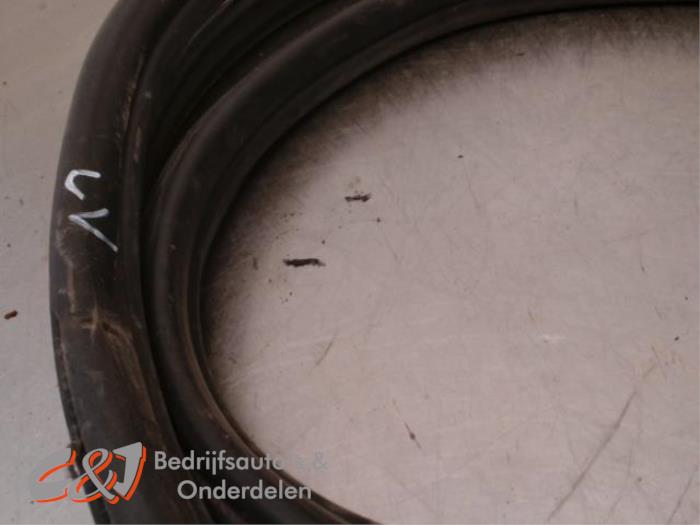 Portierrubber 2Deurs links van een Ford Transit Custom 2.2 TDCi 16V 2015