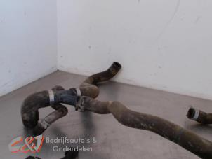 Gebruikte Koelwaterslang Ford Transit Custom 2.2 TDCi 16V Prijs € 47,25 Margeregeling aangeboden door C&J Bedrijfsauto's & Onderdelen