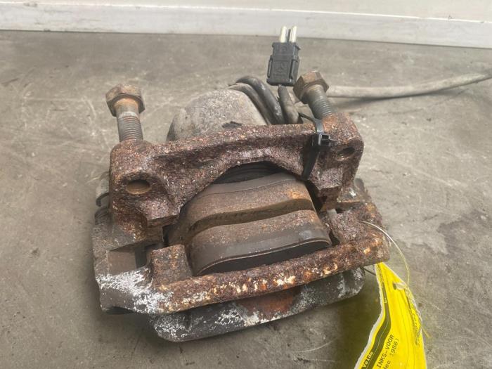 Front brake calliper, left Mercedes 190E/D