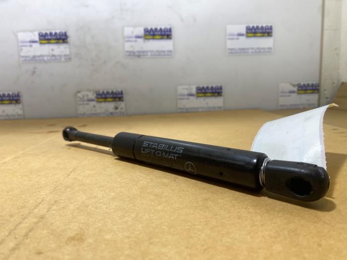 Amortyzator gazowy pokrywy silnika lewy Mercedes ML-Klasse