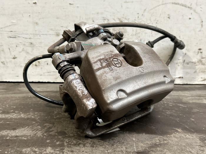 Zacisk hamulcowy lewy tyl Mercedes EQE