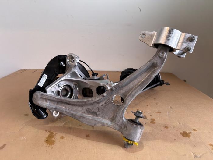 Knuckle, front left Mercedes CLA