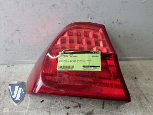 Gebruikte Achterlicht links BMW 3 serie (E90) Prijs € 90,75 Inclusief btw aangeboden door Vollux Carparts B.V.