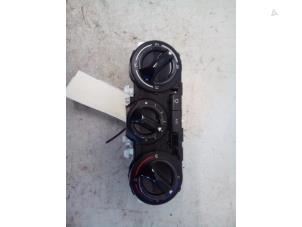 Gebruikte Airco bedieningspaneel Peugeot 208 I (CA/CC/CK/CL) 1.2 Vti 12V PureTech 82 Prijs € 49,99 Margeregeling aangeboden door Autodemontage Tegelen