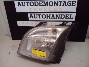 Gebruikte Linker Koplamp Ford Fusion 1.4 16V Prijs € 34,90 Margeregeling aangeboden door Autodemontage Tegelen