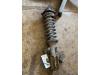 Kia Rio (DC22/24) 1.5 16V Schokbreker links-voor