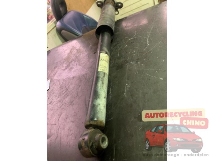 Schokdemper links-achter van een Opel Corsa D 1.2 16V 2013
