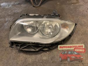 Gebruikte Linker Koplamp BMW 1 serie (E87/87N) 116i 1.6 16V Prijs € 50,00 Margeregeling aangeboden door Autorecycling Chino B.V.
