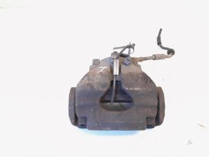 Gebruikte Remklauw (Tang) links-voor Volkswagen Transporter T5 2.5 TDi Prijs € 12,00 Margeregeling aangeboden door GEJO Revisie & Onderdelen BV