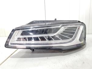 Gebruikte Linker Koplamp Audi A8 (D4) 3.0 V6 24V TFSI Quattro Prijs € 900,00 Margeregeling aangeboden door GEJO Revisie & Onderdelen BV