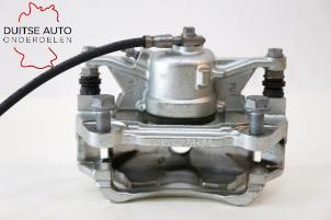 Gebruikte Remklauw (Tang) links-voor Audi Q2 (GAB/GAG) 1.0 30 TFSI 12V Prijs € 48,40 Inclusief btw aangeboden door Duitse Auto Onderdelen